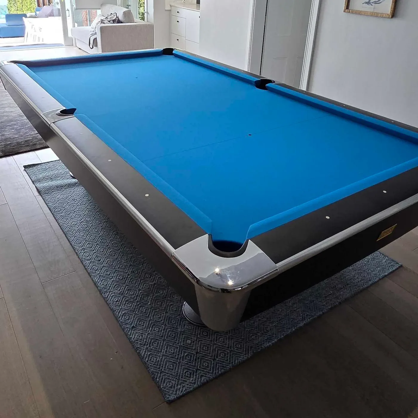 Pool table in home game room